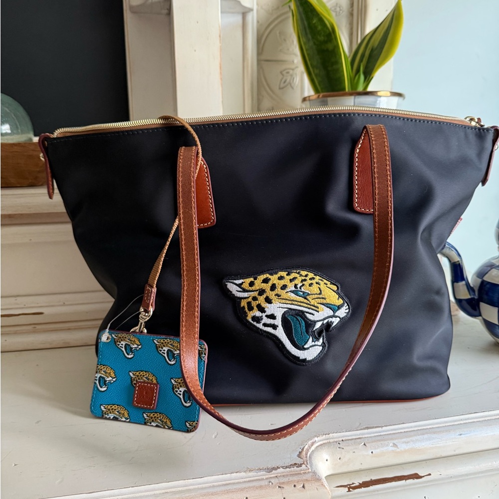 Dooney & Bourke Black Tote with Brown Accents and Jaguar logo